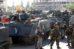 اشتباكات بالمدفعية بين أنصار الأسد و معارضيه في لبنان