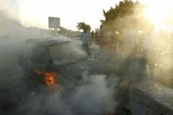 إصابة 18 شخصا جراء تفجير سيارتين مفخختين شرق ليبيا 