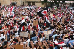 مسيرة مؤيدة ترحب بالفيتو الروسي والصيني في دمشق