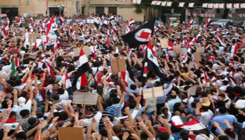 مسيرة مؤيدة ترحب بالفيتو الروسي والصيني في دمشق
