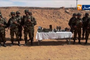 دفاع/ كشف مخبأ للذخيرة يحوي على قذائف هاون وقنابل يدوية و336 طلقة نارية