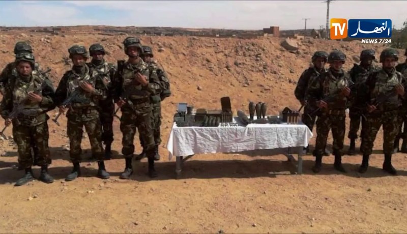 دفاع/ كشف مخبأ للذخيرة يحوي على قذائف هاون وقنابل يدوية و336 طلقة نارية