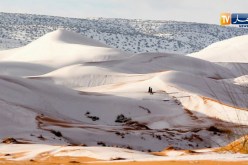 عين الصفراء.. صور الكثبان الرملية المغطاة بالثلوج تجول العالم