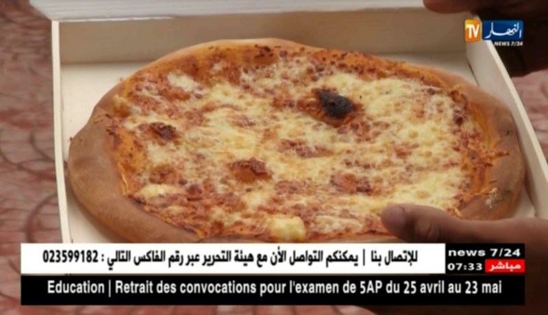 مجتمع: لمواكبة زمن السرعة..موزع آلي يحضر البيتزا في 3 دقائق