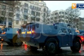 مدرعات الشرطة الفرنسية تقتحم شارع الإيليزيه وسط إطلاق كثيف للقنابل المسيلة للدموع لفك المتظاهرين