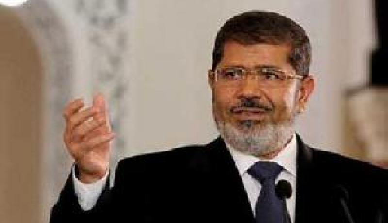 مرسي : بشار الأسد مجرم حرب