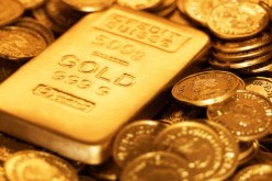 إرتفاع الذهب إثر تراجع الدولار و أسواق الأسهم