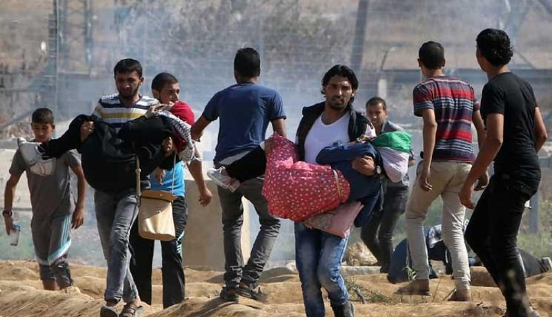 إصابة عشرات الفلسطنيين في مواجهات مع الإحتلال الإسرائيلي بغزة