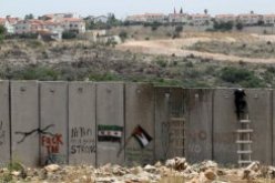 الفلسطينيون يهددون باجراءات قضائية ضد الاستيطان الاسرائيلي