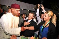 نجل القذافي يستقبل ريم غزالي في أول خرجة لها