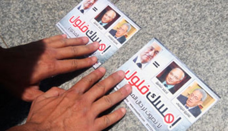 لجان شعبية بالدقى توزع منشورات ضد ترشيح الفلول