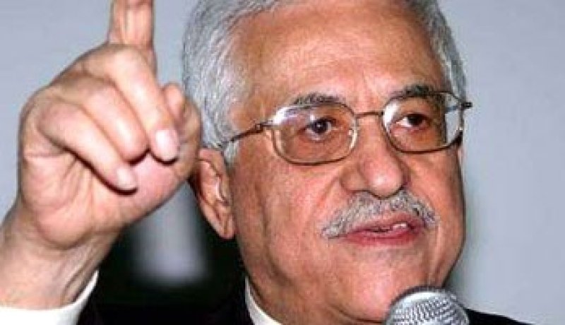 هاآرتس: الرئيس عباس هنأ أولمرت على تبرئته فى قضايا فساد