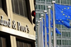 الاتحاد الأوروبي ينتقد تخفيض التصنيف الائتماني لتسع دول في منطقة اليورو