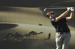 روك يفوز بلقب بطولة أبوظبي للغولف بعد تراجع أداء وودز