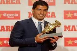 بالصور.. سواريز يتسلّم جائزة الحذاء الذهبي
