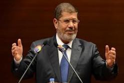 مرسي يشدد على ان صلاحياته الموسعة مؤقتة