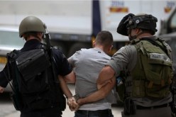 الصهاينة يعتقلون 12 فلسطينيا في الضفة والقدس
