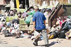 تحديد أوقات وأماكن لرمي القمامة وفرض غرامات على المخالفين