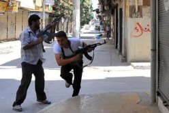 مقتل 21 مدنيا في مخيم اليرموك في دمشق وقصف على حلب