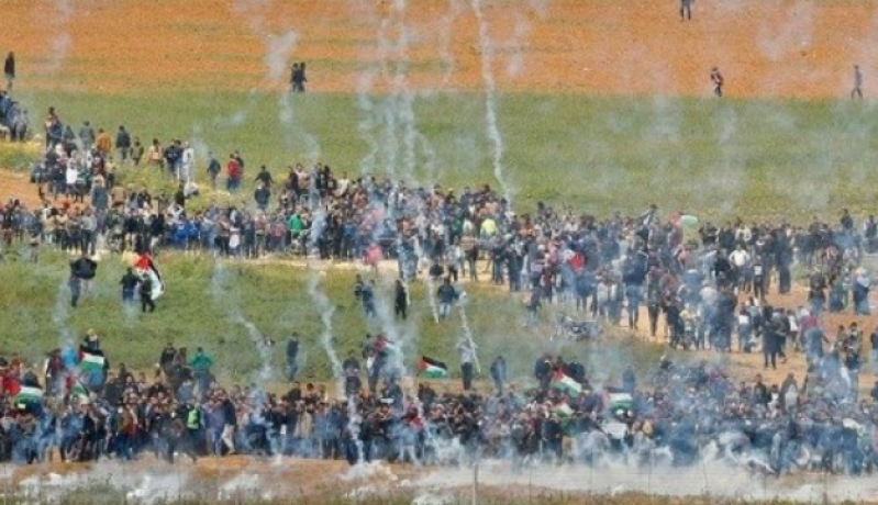 14 شهيدا و 1416 جريحا في مسيرة يوم الأرض بغزة