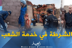 بالصور.. رجال الشرطة يساعدون العائلات المتضررة بعين قزام