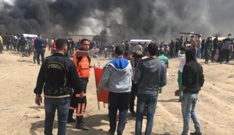 112 جريحا في جمعة حرق علم الاحتلال الصهيوني بغزة