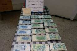 بالصور.. حجز 9 آلاف دينار تونسي بمركز أم الطبول