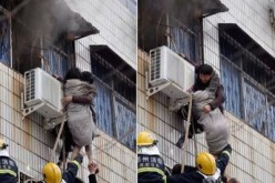 بالفيديو .. شخص مشلول يتسلق مبنى محترق لإنقاذ امرأة حامل