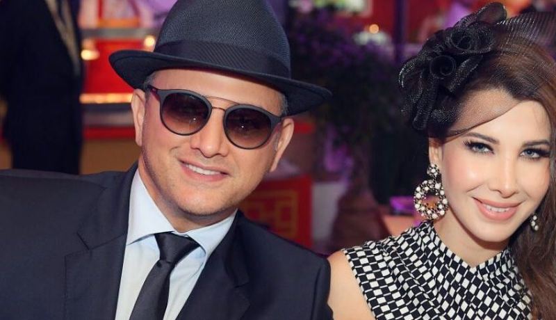 بالفيديو.. ظهور مفاجئ لنانسي عجرم وزوجها من شرفة منزلهما