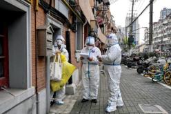 شنغهاي تستعد لمعركة كوفيد الأخيرة والصين تعتذر عن استضافة كأس آسيا 2023