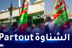 حاج جزائري يصنع الحدث بعلم المولودية