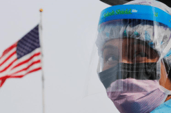 كورونا تعود لأمريكا وجدل حول العودة لإرتداء الكمامات