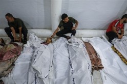 51 شهيدا وعشرات الجرحى في مجزرة للجيش الصهيوني بمخيم المغازي