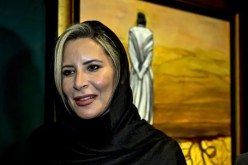 عائشة القذافي تستحضر ذكرى مقتل والدها في لوحات فنيّة