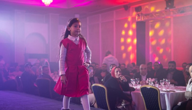 عرض أزياء خاص بالأطفال للزي المدرسي